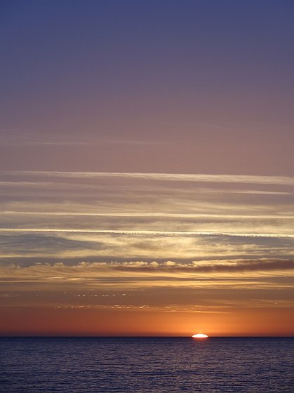 Seconds before sunset at Novo Sancti Petri beach