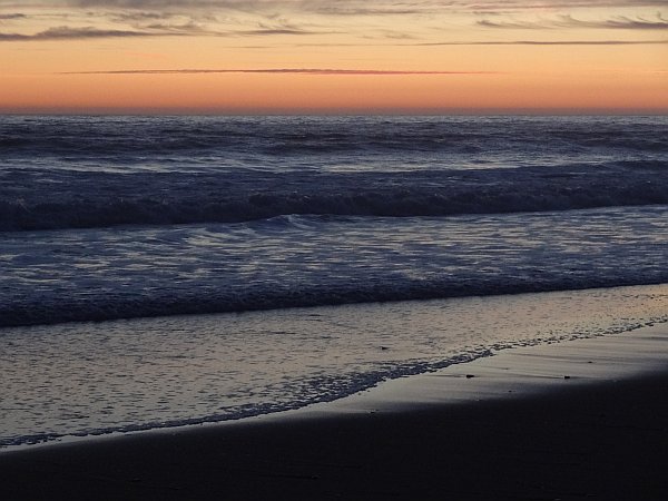 Beach and waves after sunset