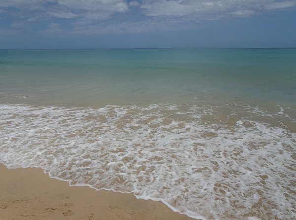 Waves running up on Costa Calma beach