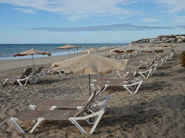 Sun loungers at beach near Crystal Beach hotel