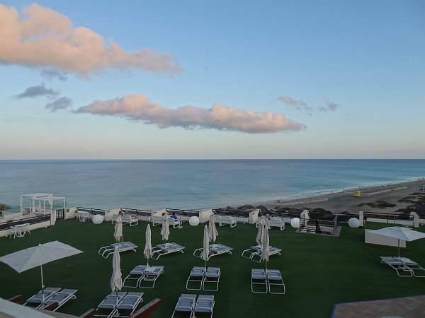 Sun loungers at pool of Crystal Beach hotel