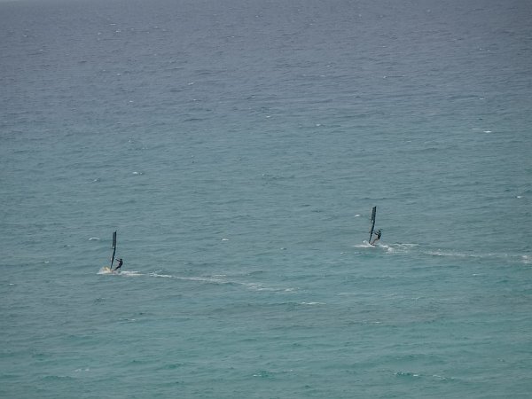 Two windsurfers at Costa Calma beach