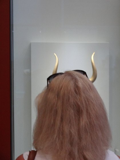 Visitor in front of exhibit in Archeological Museum