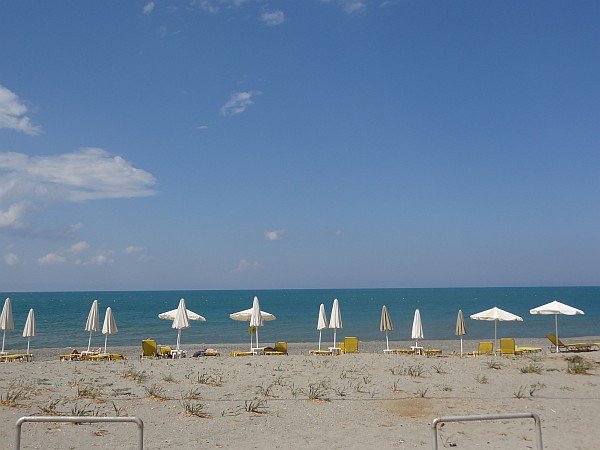 Sun loungers and parasols at Asterion hotel beach