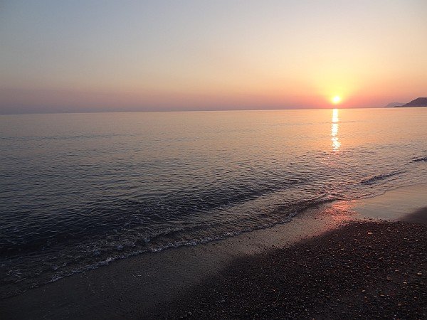 Beach shore at sunrise