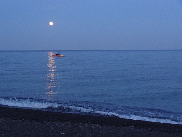 Perivolos beach after sunset and mooonrise