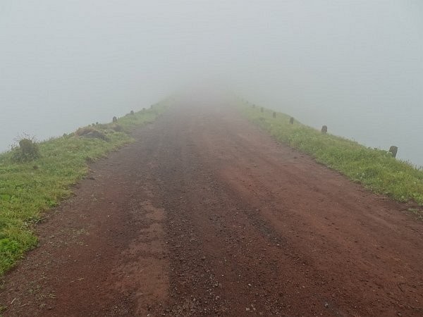Mountain trail in thick fog