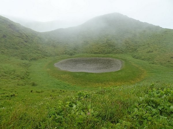 Crater lake near mountain trail