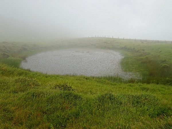 Crater lake near mountain trail