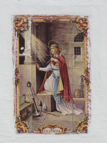 Tiles over house door at São Roque depicting St. Filomena