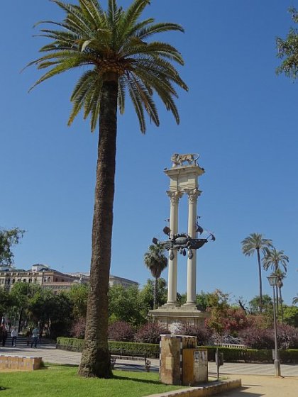 Columbus monument column in Murillo gardens (jardines de Murillo)